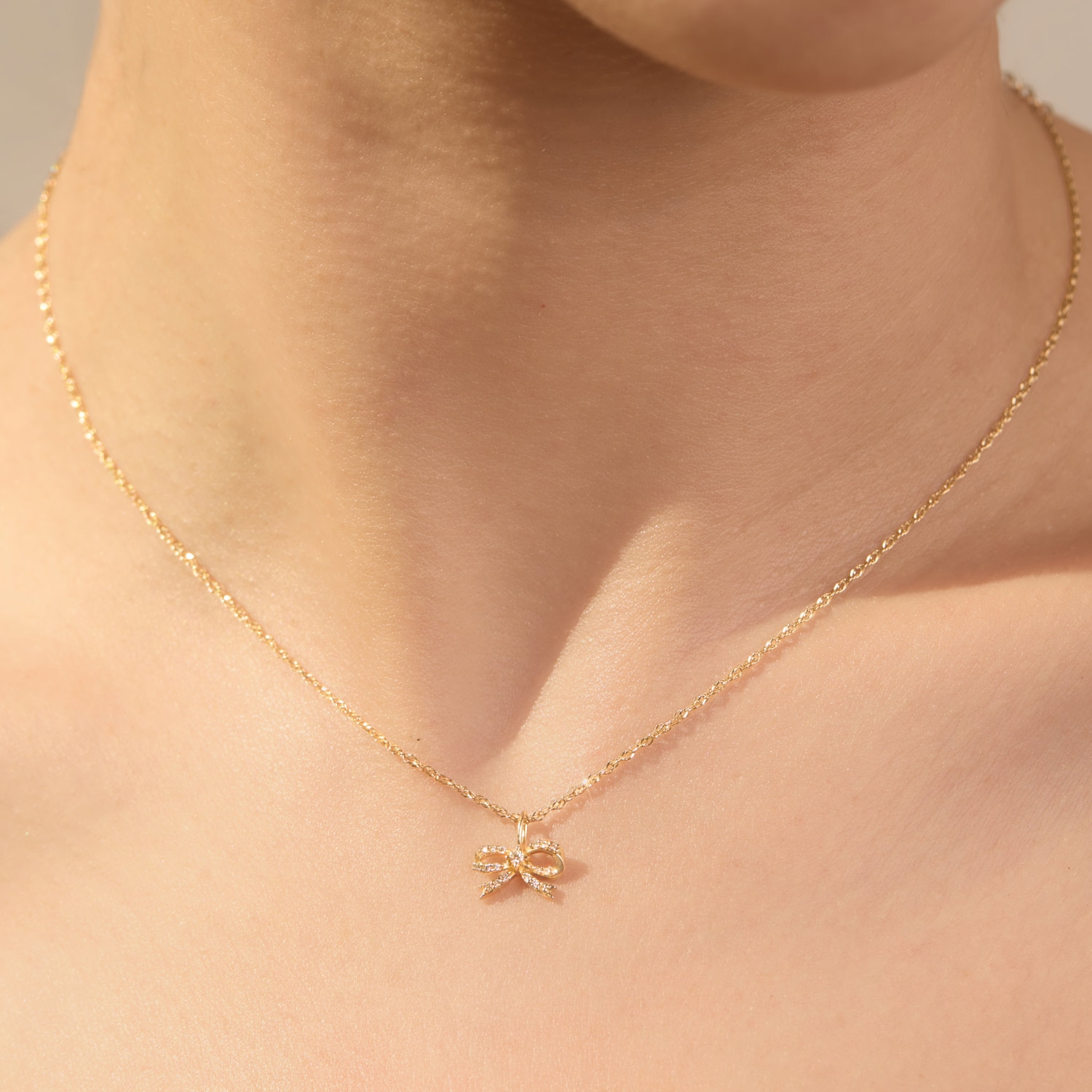 Lovesick Diamond Bow Gold Charm - Image 3