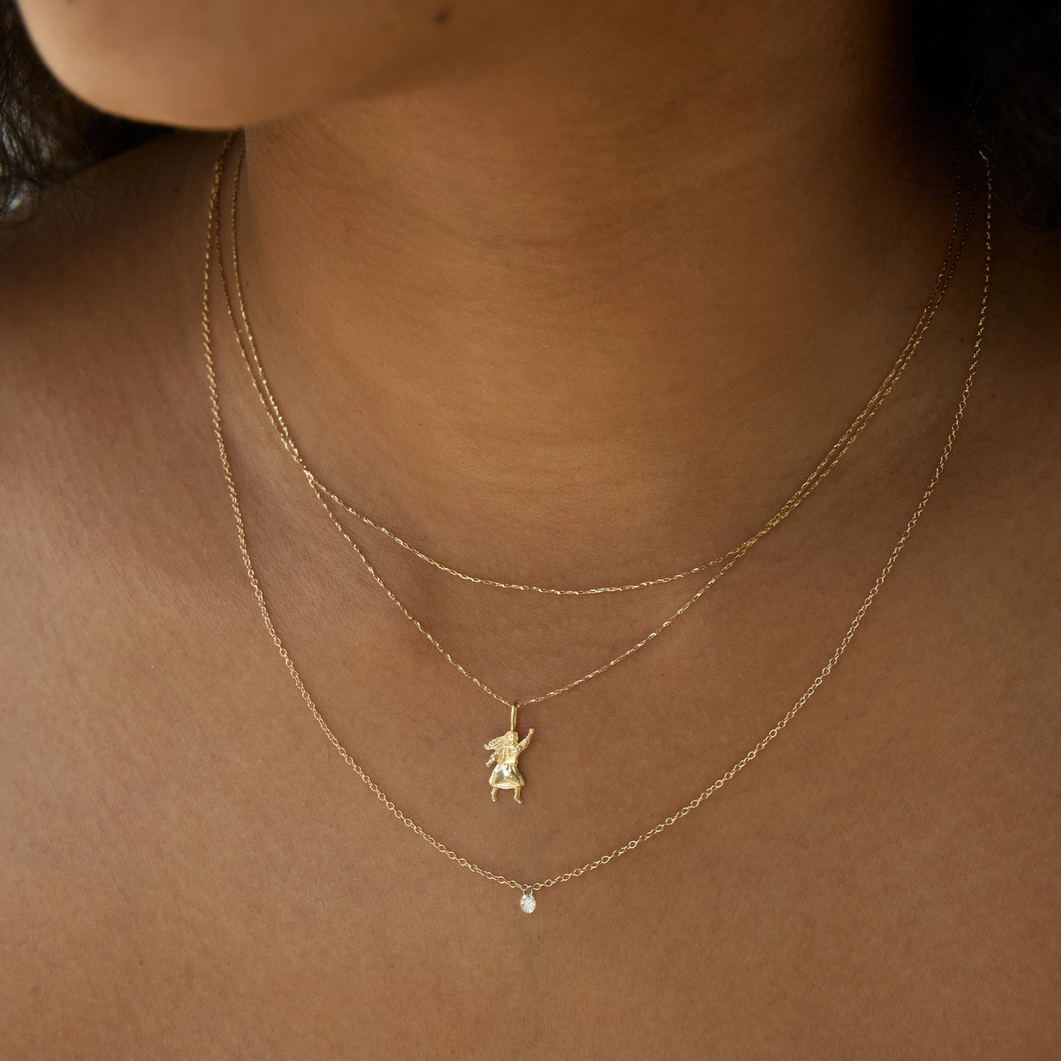 Peaceful Girl With Fist Charm - Image 3
