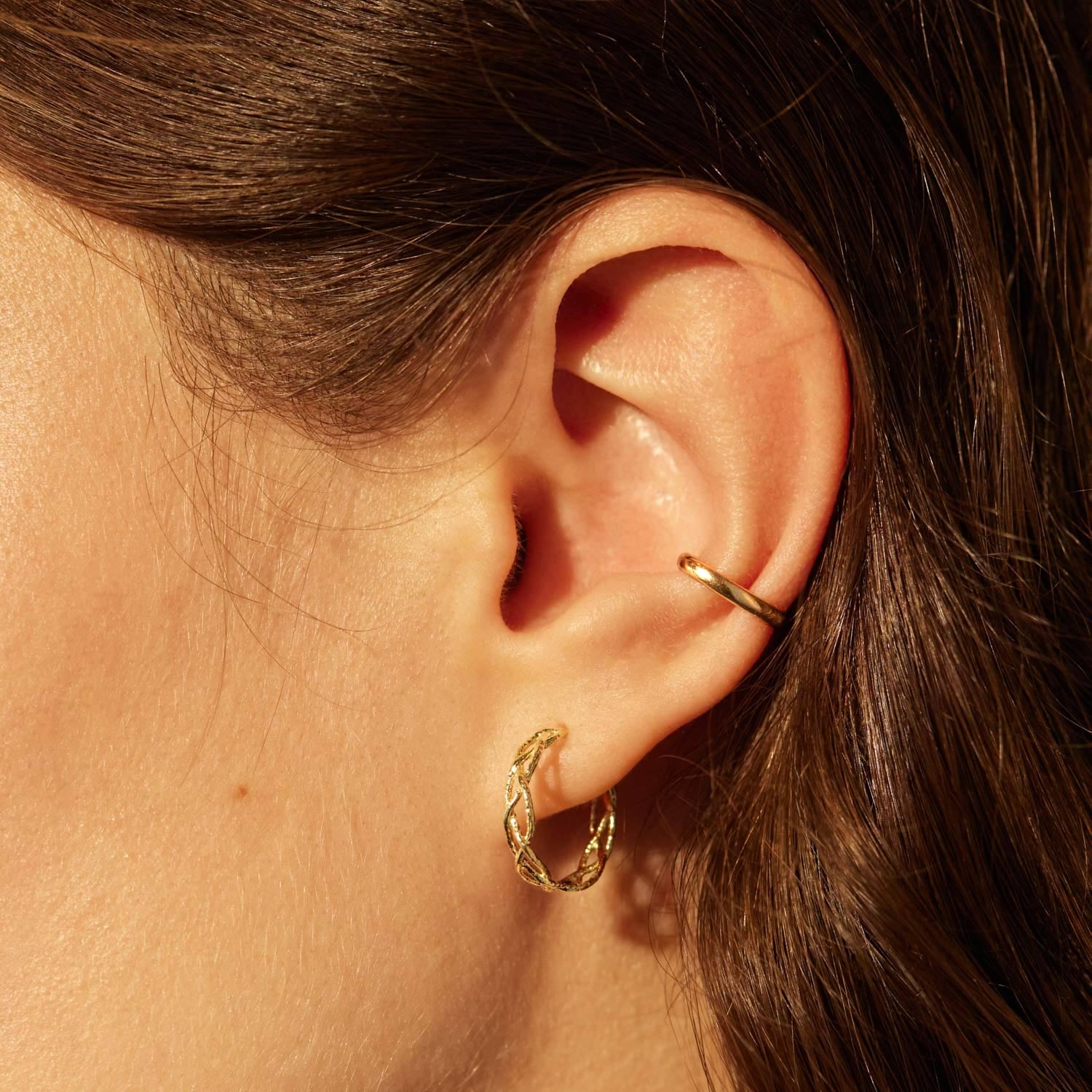 Alternative view of Large Braided Gold Hoop (single)
