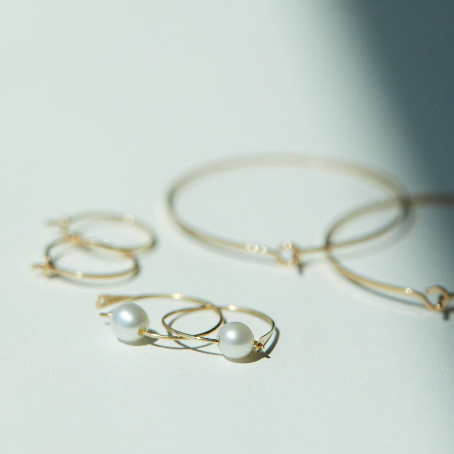 Pearl on a Wire Gold Hoop Earrings (single) - Image 8