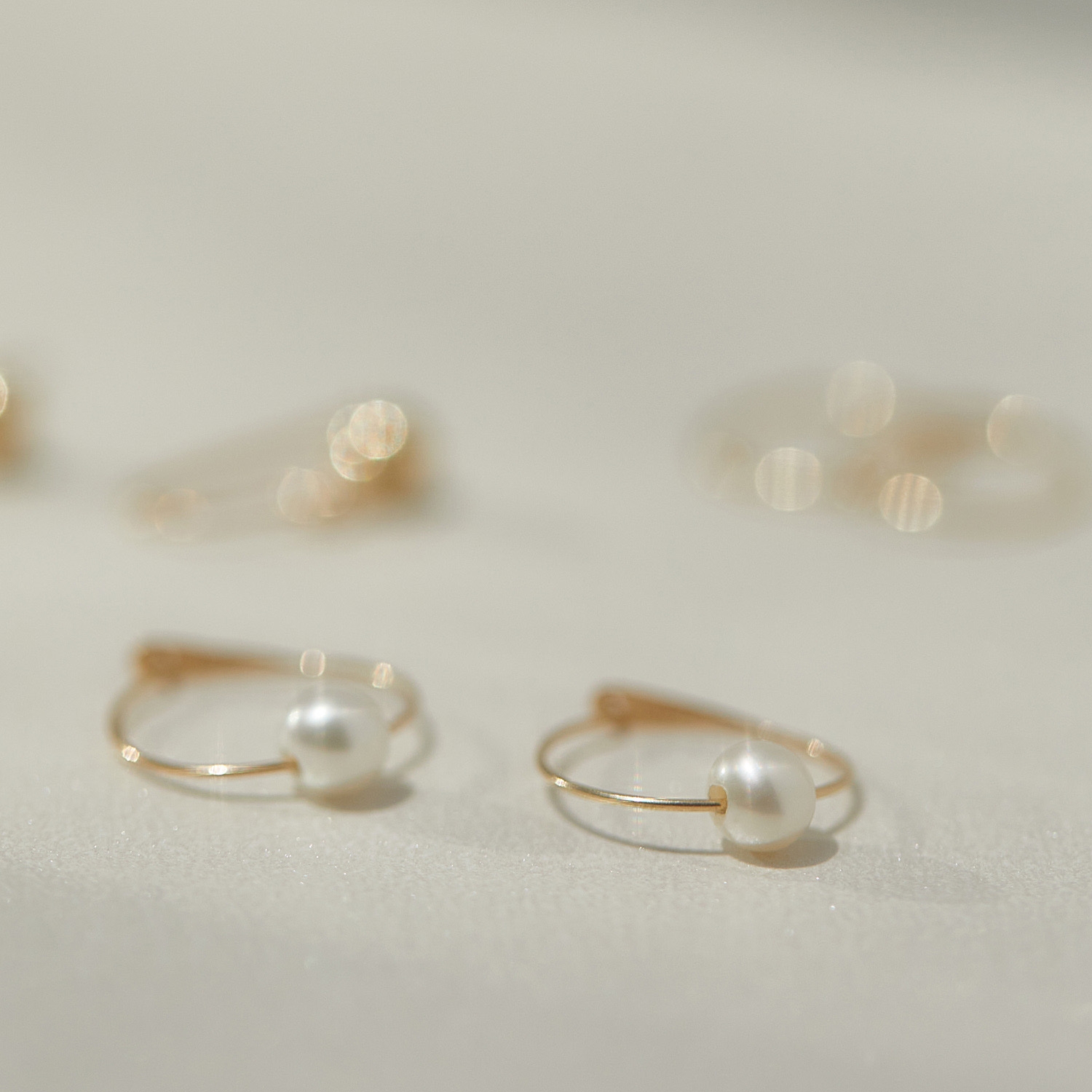 Pearl on a Wire Gold Hoop Earrings (single) - Image 7