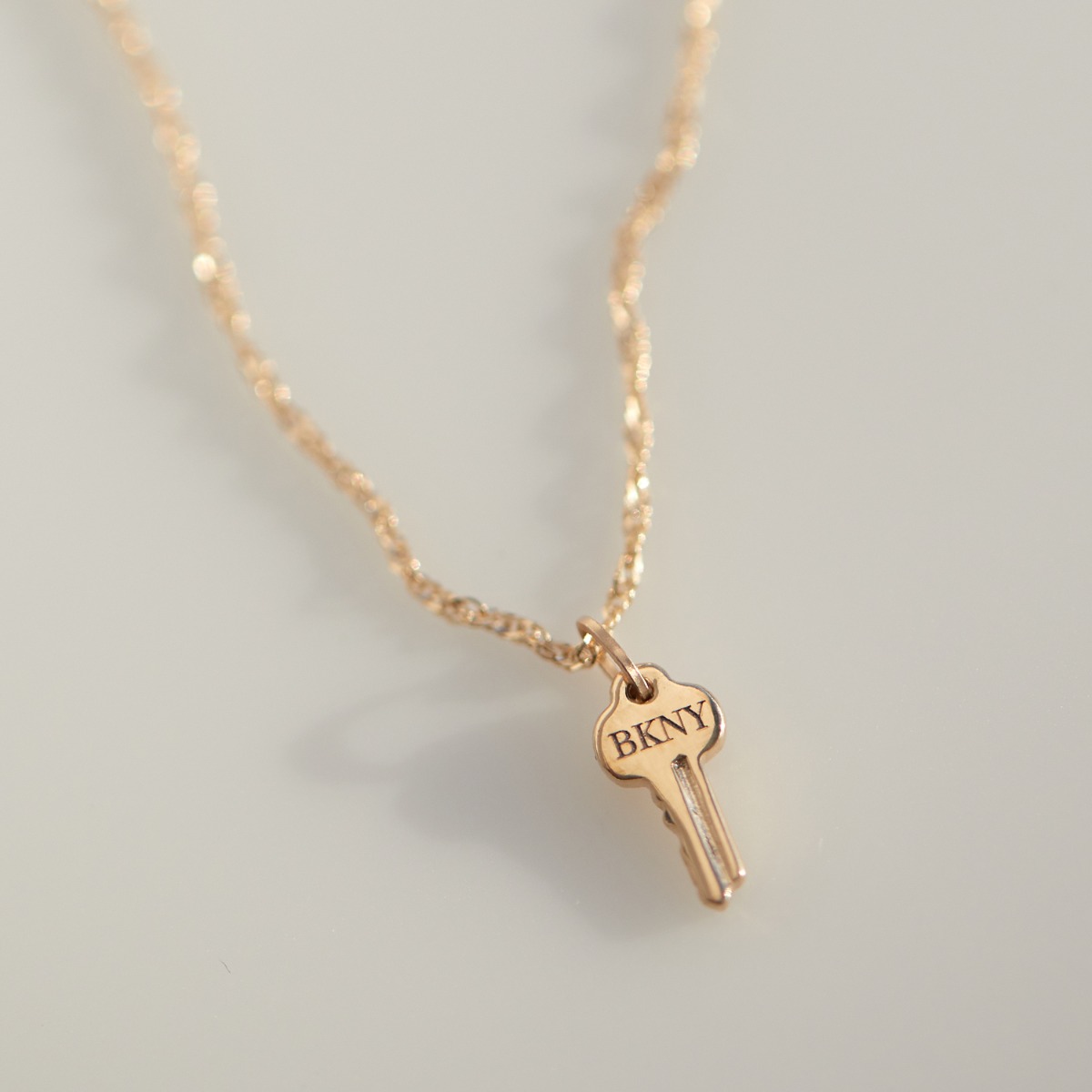 Tiniest Gold Key Charm - Image 9
